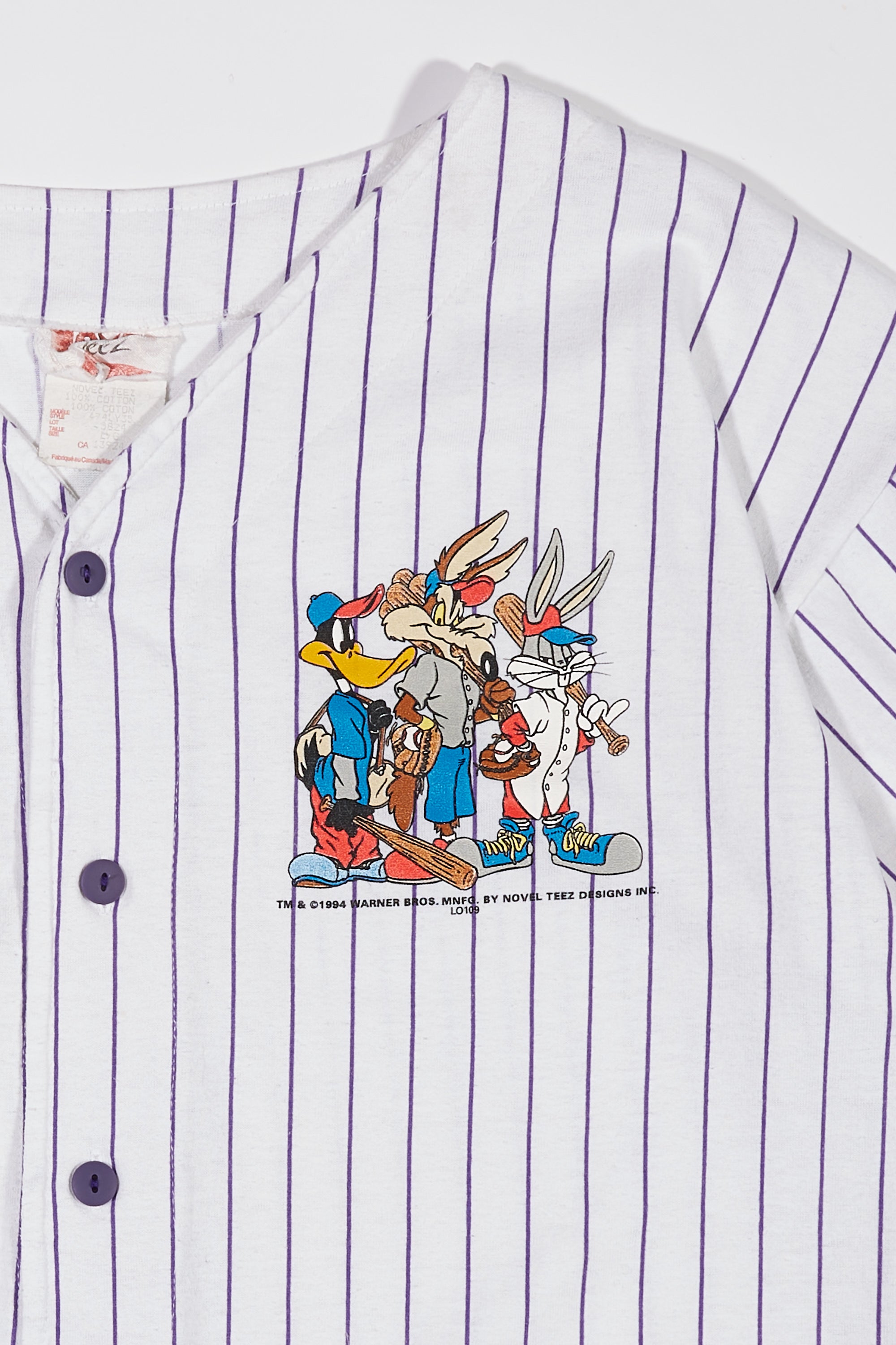 90's Warner Bros Looney Tunes Jersey By Novel Teez in a vintage style from thrift store Twise Studio