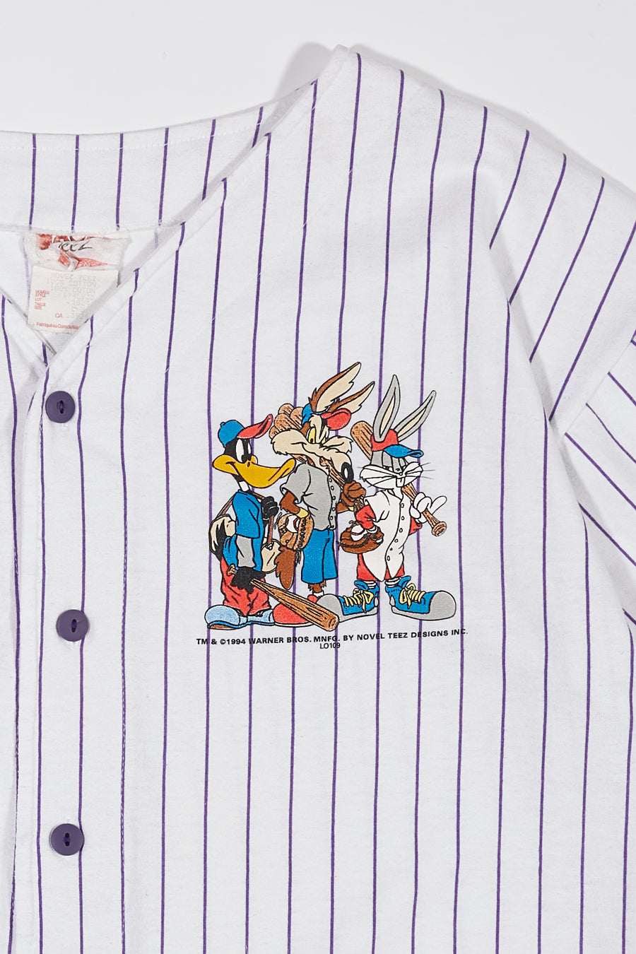 90's Warner Bros Looney Tunes Jersey By Novel Teez in a vintage style from thrift store Twise Studio