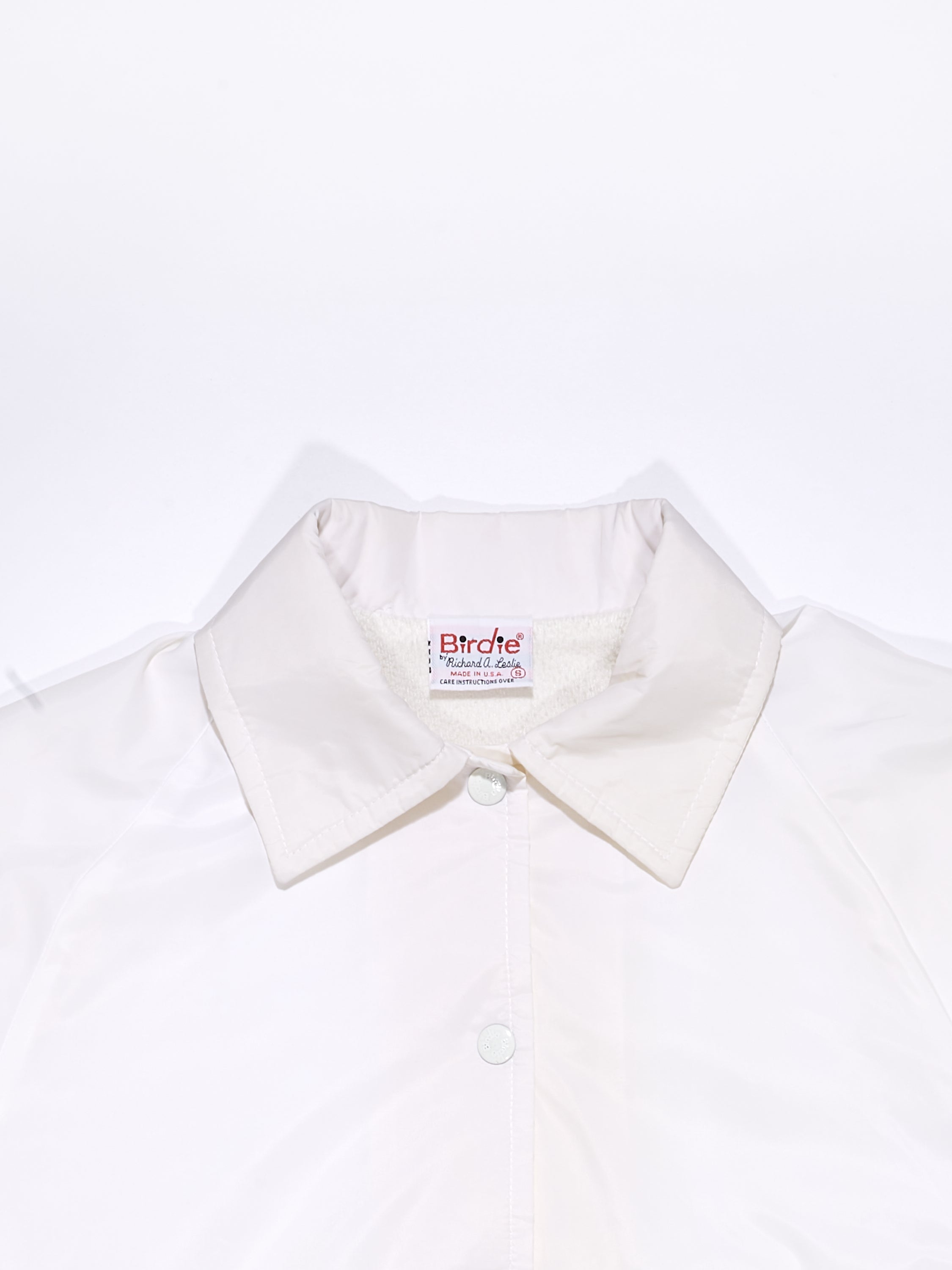 Classic White Coach's Jacket in a vintage style from thrift store Twise Studio