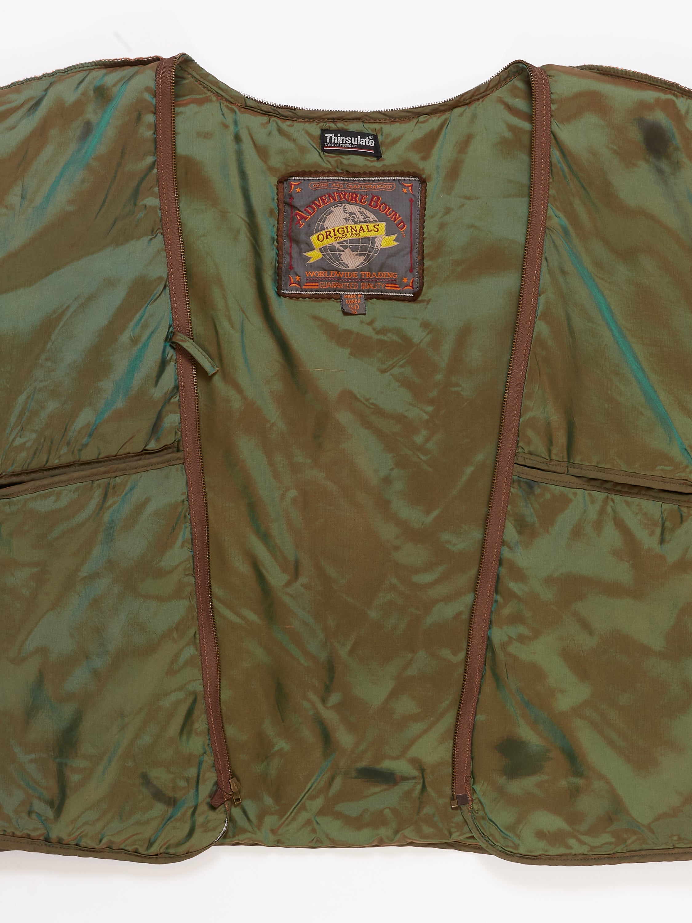 Green Reflective Liner Vest in a vintage style from thrift store Twise Studio