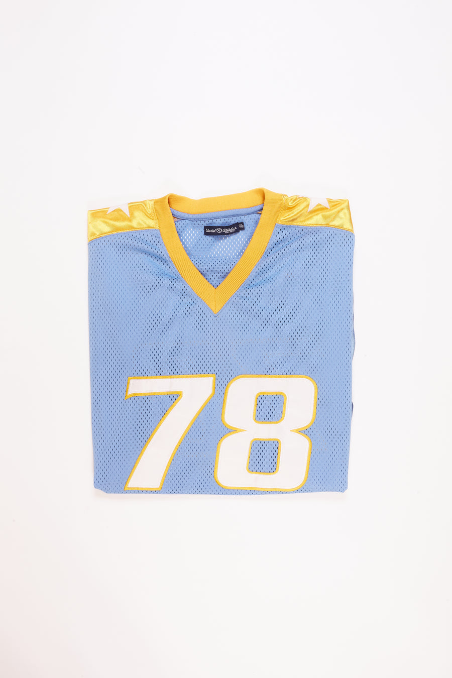 Early 2000s World Athletic Jersey in a vintage style from thrift store Twise Studio