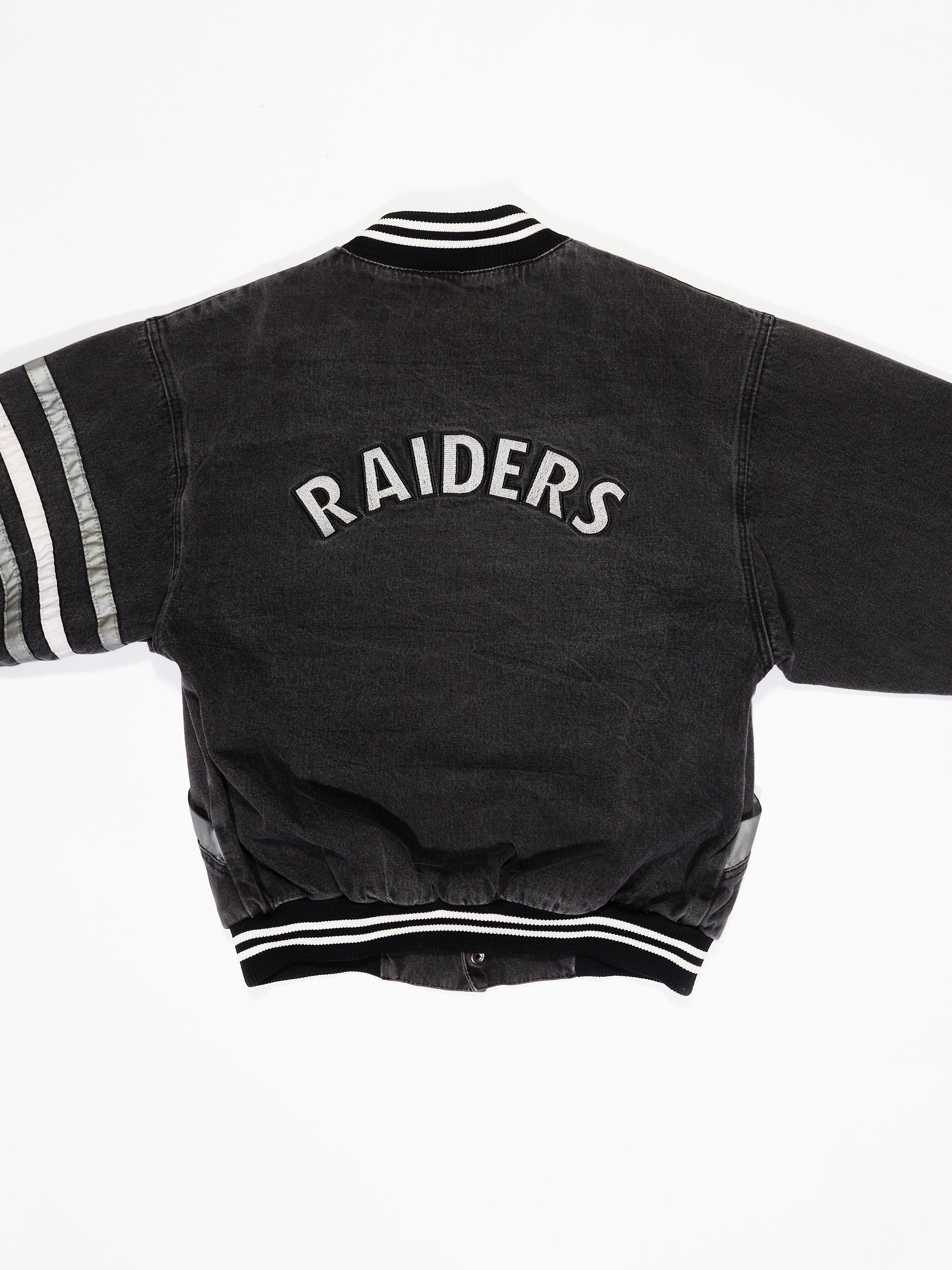 Los Angeles Oakland Raiders Denim Jacket in a vintage style from thrift store Twise Studio